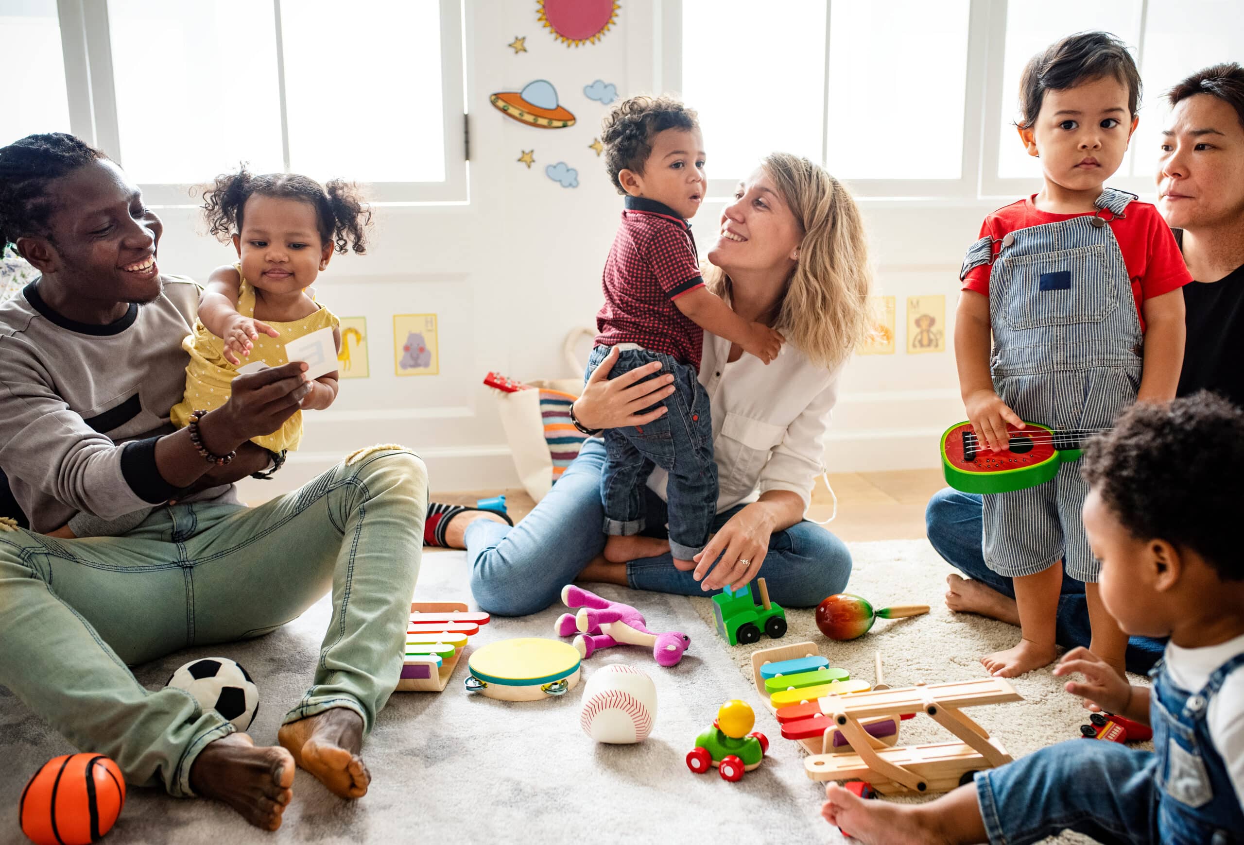 Regroupement de parents et d'enfants lors d'une activité à Lu-Nid Maison de la famille